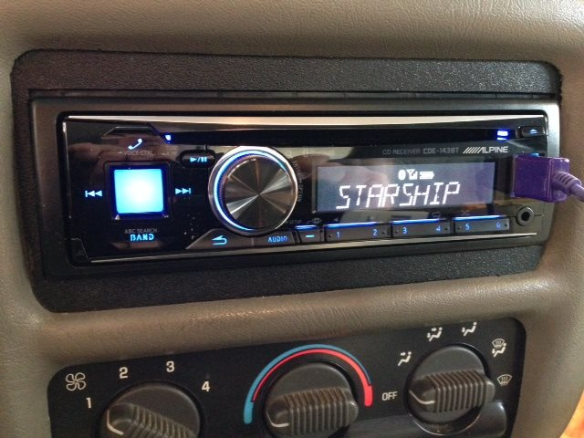 Single-DIN Alpine Bluetooth receiver installed in a factory dash by Eureka Car Stereo